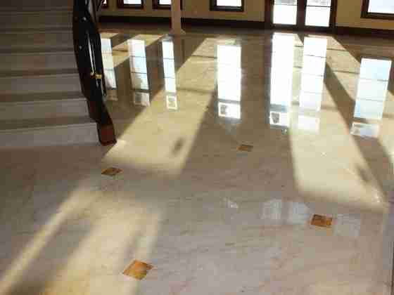 Honing and Polishing Services Used to Remove Scratches on Marble Floor Bay Shore Cleaning & Restoration